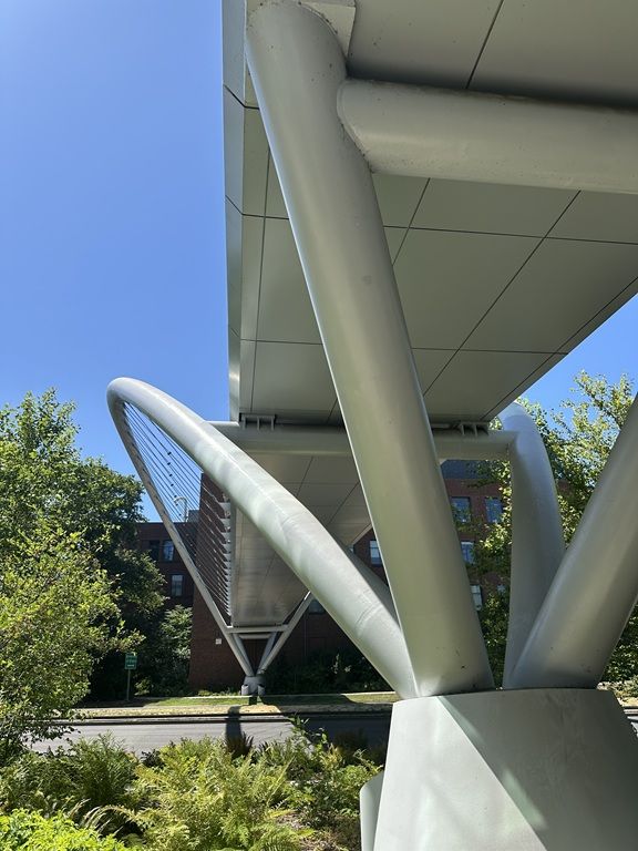 Phil and Penny Knight Campus for Accelerating Scientific Impact at the University of Oregon under bridge view